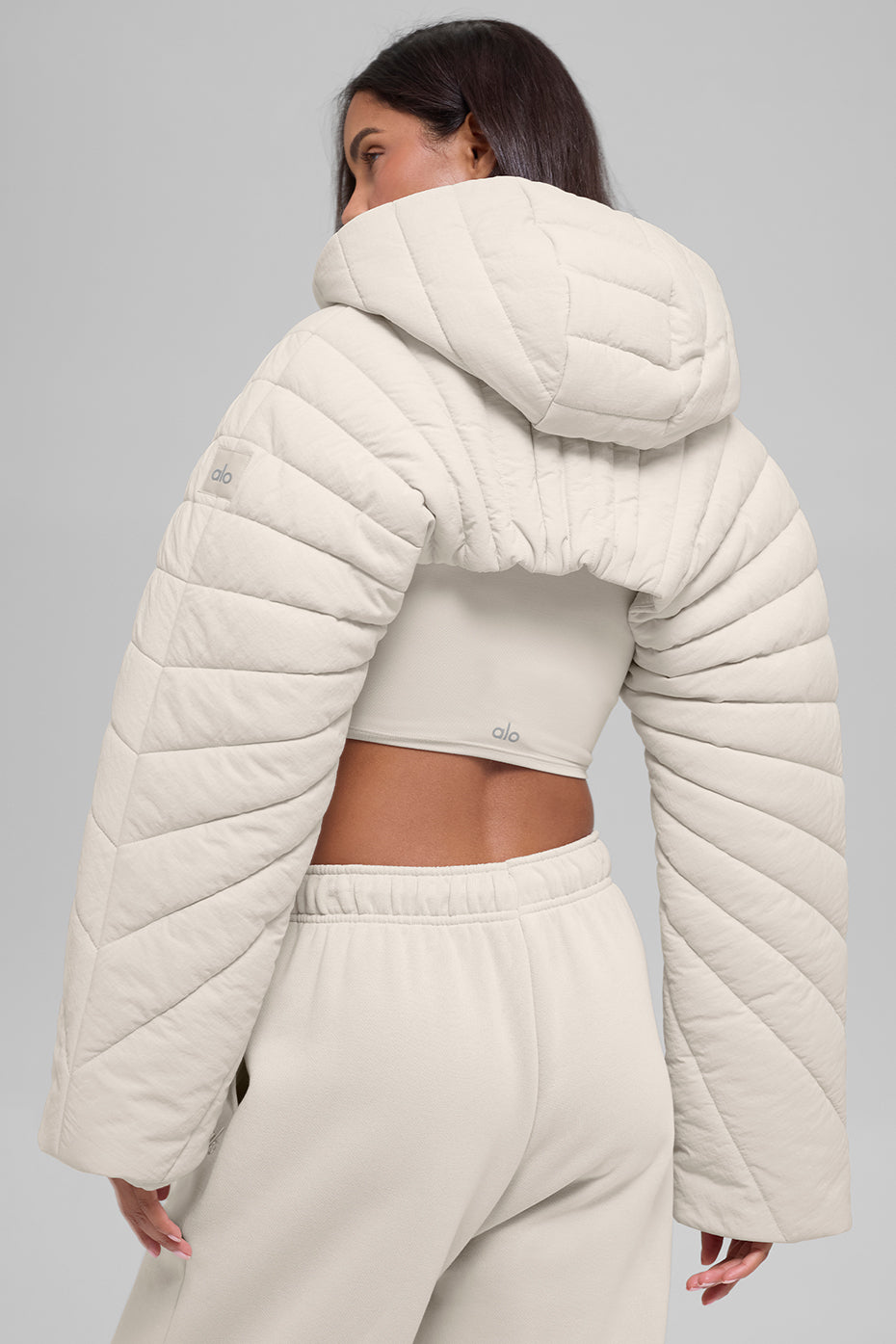 Gesteppter Starlight Puffer-Shrug – Bone